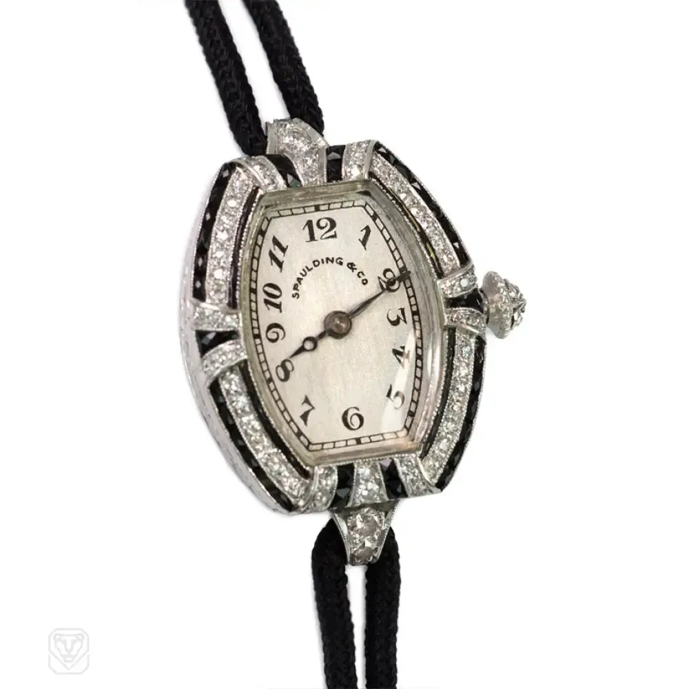 Art Deco diamond and onyx watch with cord band