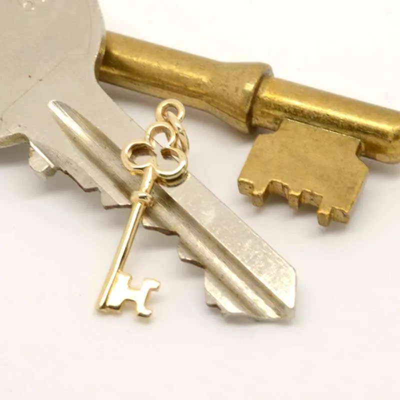 Gold Small Key Charm