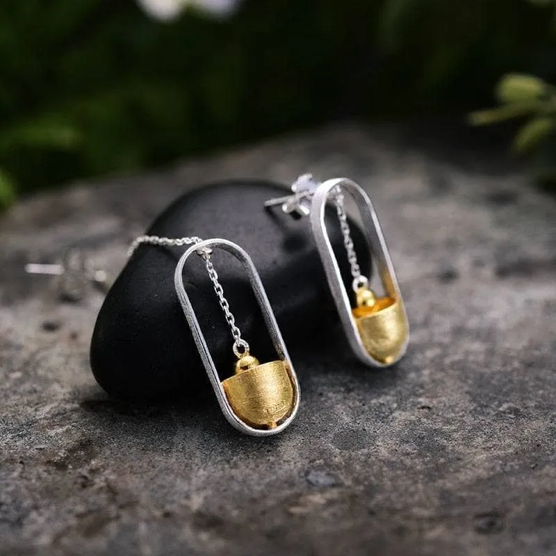Hammer Ram Dangle Earrings